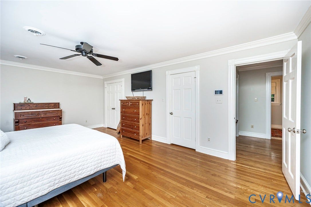 Recessed lighting, crown molding, wood-finish flooring, ceiling fan, and paneled interior doors