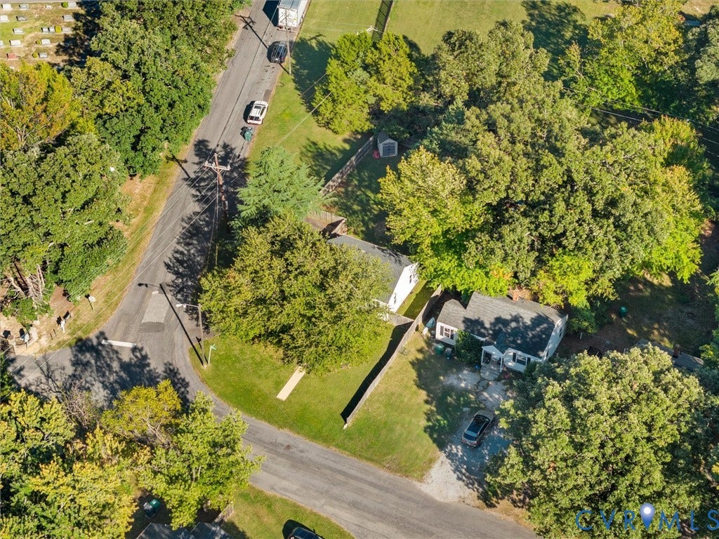 3933 Alma Avenue, Richmond, VA 23222 Residential property with a gabled roof and surrounding mature trees