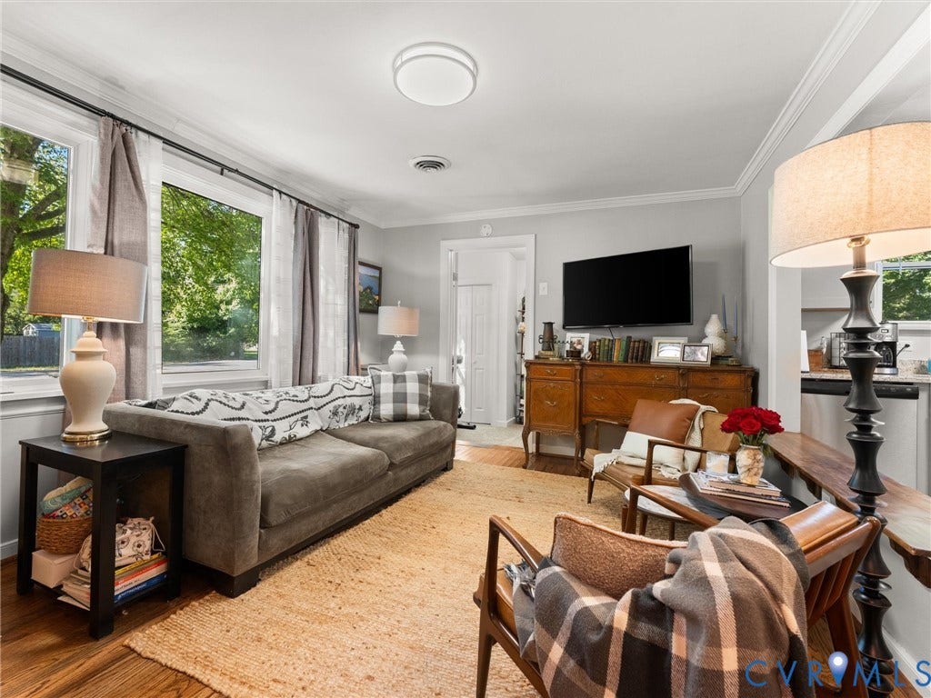 3933 Alma Avenue, Richmond, VA 23222 Hardwood flooring, crown molding, abundant natural light, recessed lighting, and a built-in credenza