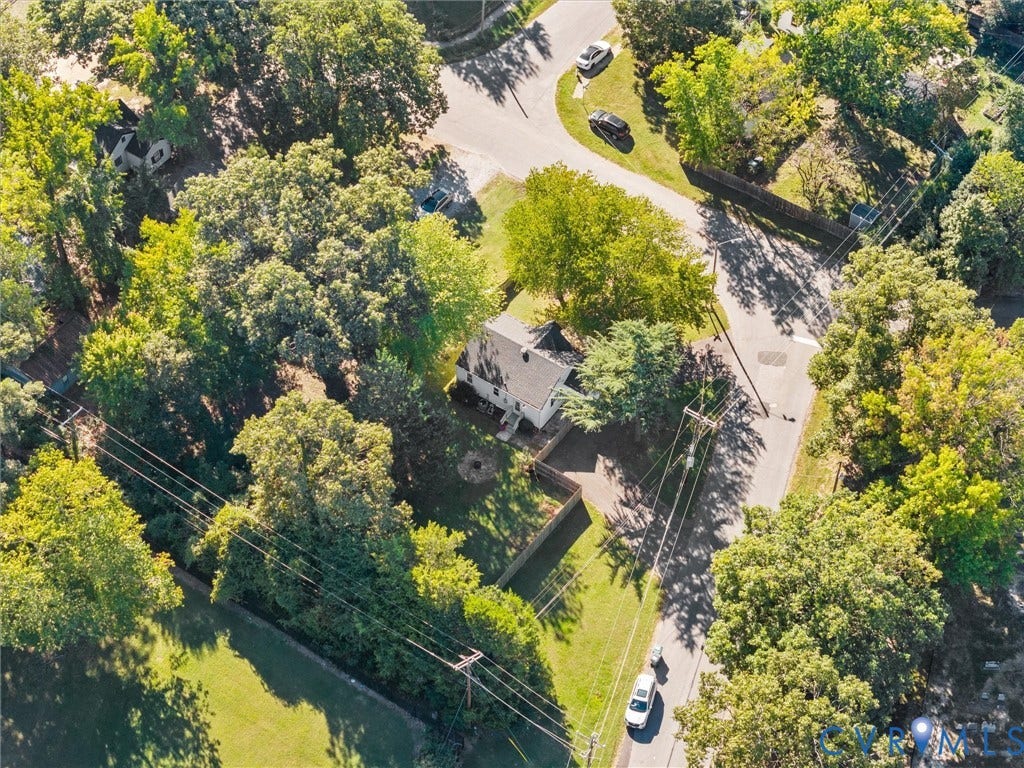 3933 Alma Avenue, Richmond, VA 23222 Property featuring a traditional exterior, gabled roofline, and established trees