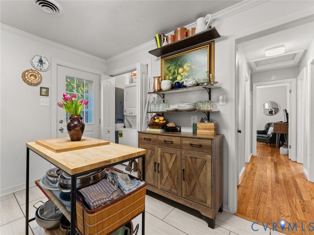 3933 Alma Avenue, Richmond, VA 23222 Kitchen space with white tile flooring and a light wood finish island