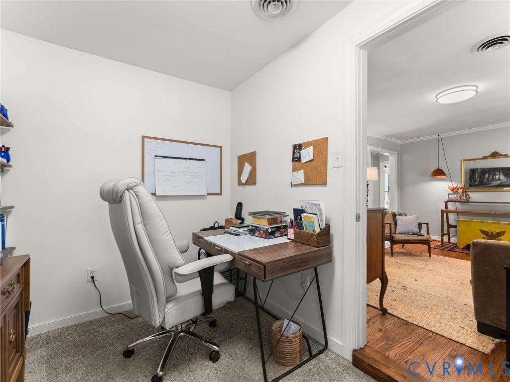 3933 Alma Avenue, Richmond, VA 23222 Carpeted room with a wall-mounted whiteboard and cork board