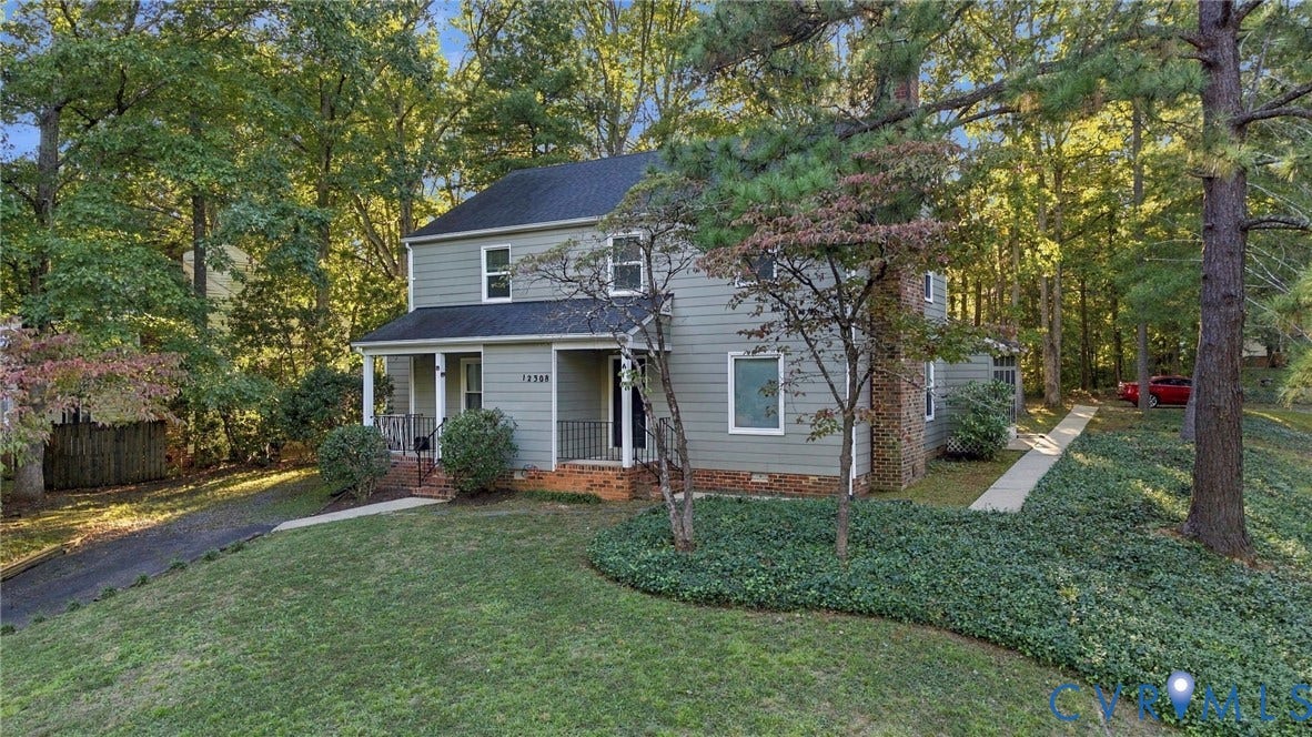 12308 Poplar Forest Drive, Tuckahoe Village, Henrico, VA 23238 Two-story exterior with light green siding and white trim