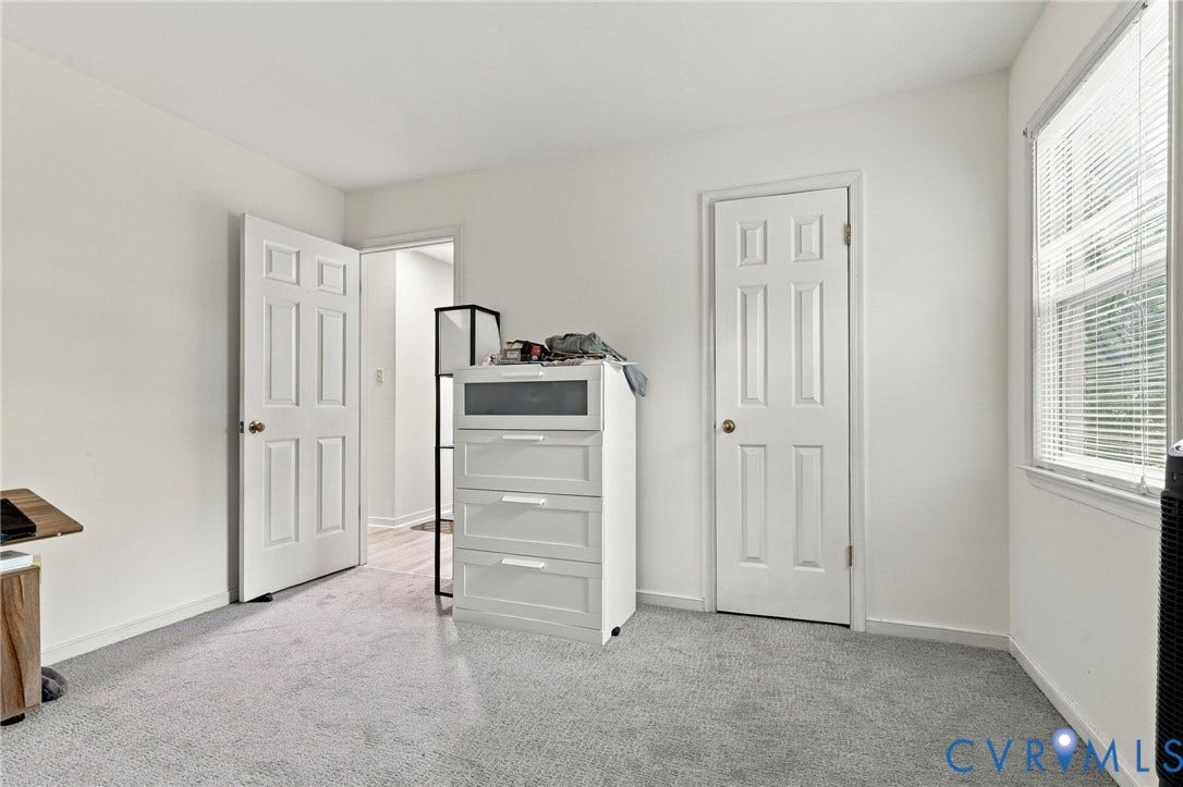 12308 Poplar Forest Drive, Tuckahoe Village, Henrico, VA 23238 Neutral wall finishes, paneled interior doors, and light-toned carpeting