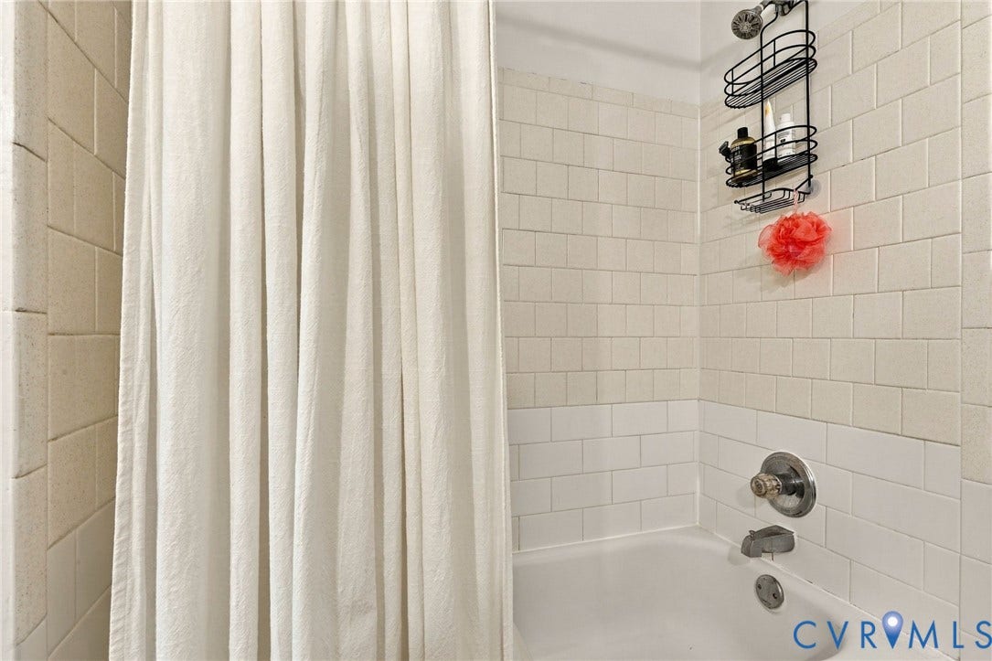 12308 Poplar Forest Drive, Tuckahoe Village, Henrico, VA 23238 Tub and shower combination featuring subway tile surround and shower head