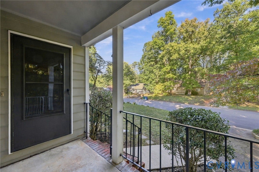 12308 Poplar Forest Drive, Tuckahoe Village, Henrico, VA 23238 Covered concrete front porch featuring a metal railing, screen door, and brick accents