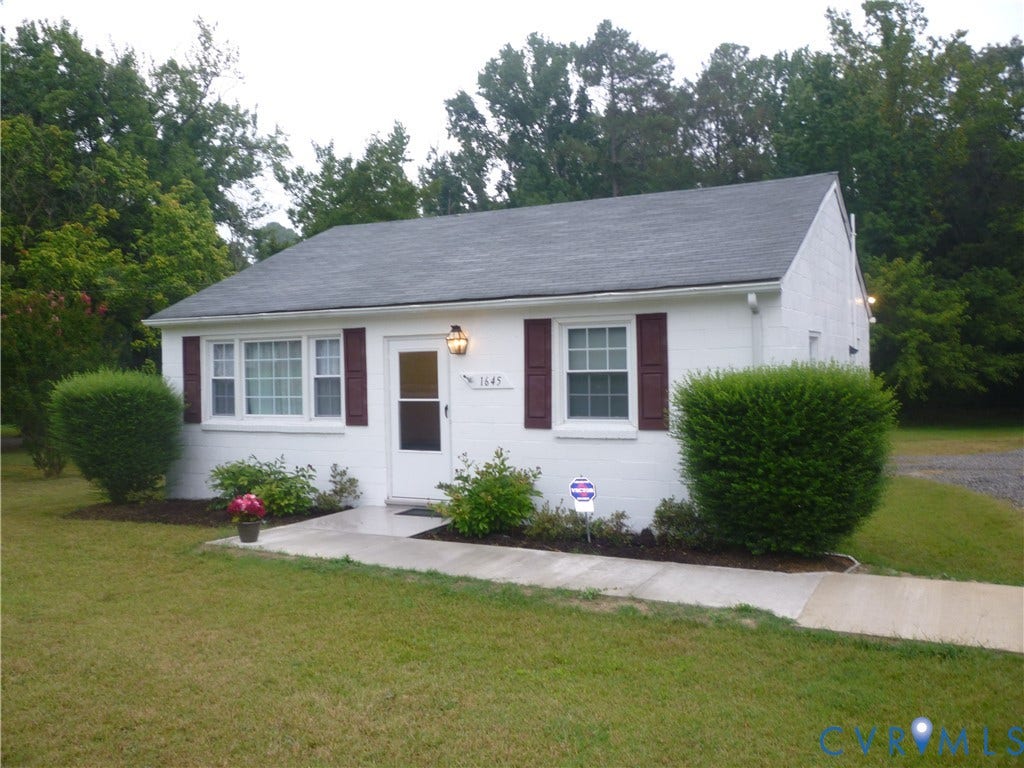 1645 Manakin Road, Manakin, VA 23103 White painted brick exterior with a gray asphalt shingle roof