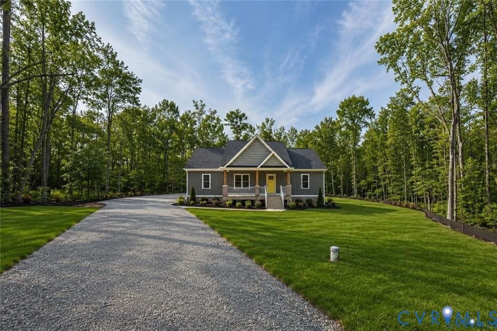 5301 Chimney Springs Drive, Goochland, VA 23063 Ranch-style residence featuring a gray exterior, covered front porch with wood columns, and a bright yellow front door
