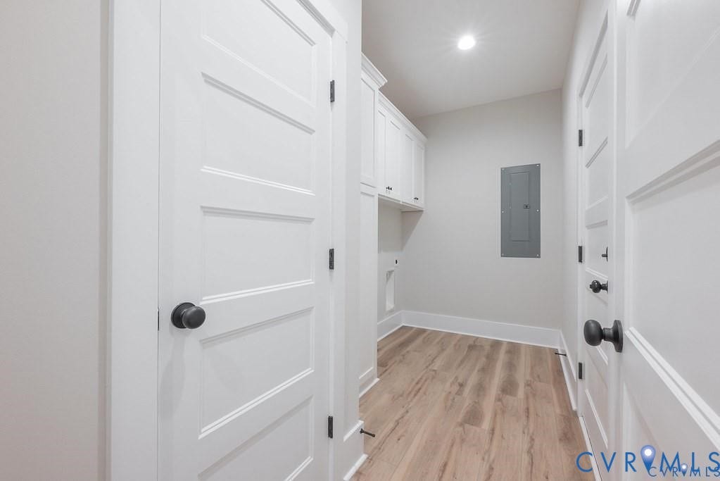 5301 Chimney Springs Drive, Goochland, VA 23063 Wood-finish flooring, recessed lighting, and white paneled doors with dark hardware