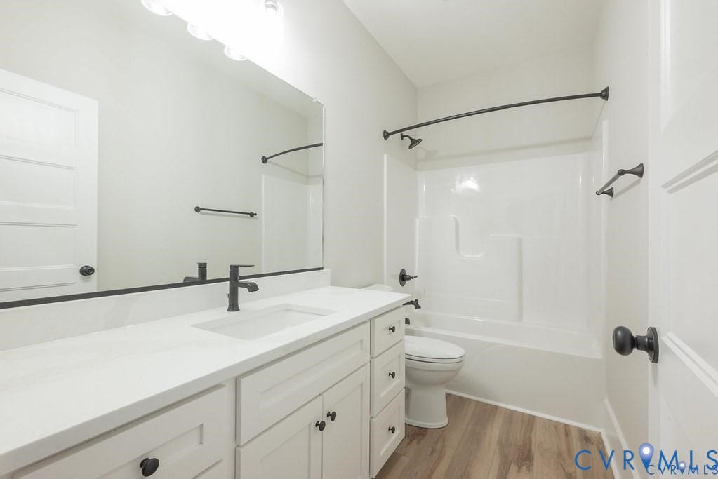 5301 Chimney Springs Drive, Goochland, VA 23063 White shaker vanity with a light-toned countertop and an undermount sink
