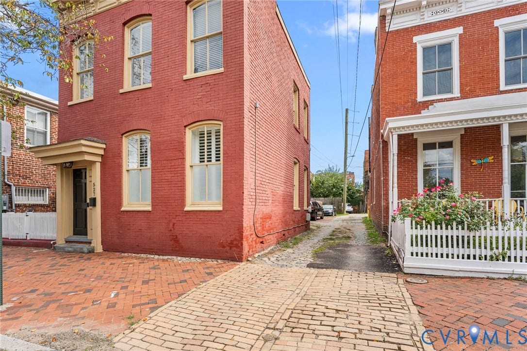 Red brick facade with contrasting trim