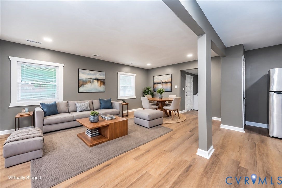 634 Fayette Avenue, Richmond, VA 23222 Recessed lighting illuminates the wood-finish flooring and neutral wall tones