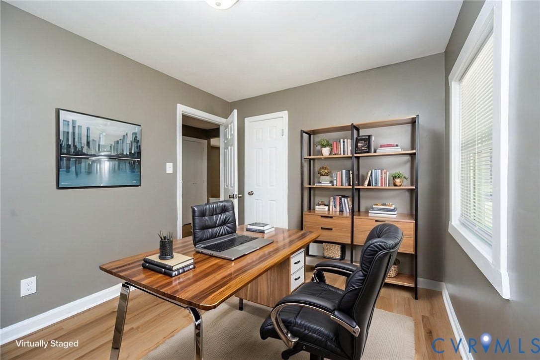 634 Fayette Avenue, Richmond, VA 23222 Light wood-finish flooring, neutral wall paint, and a white trim package