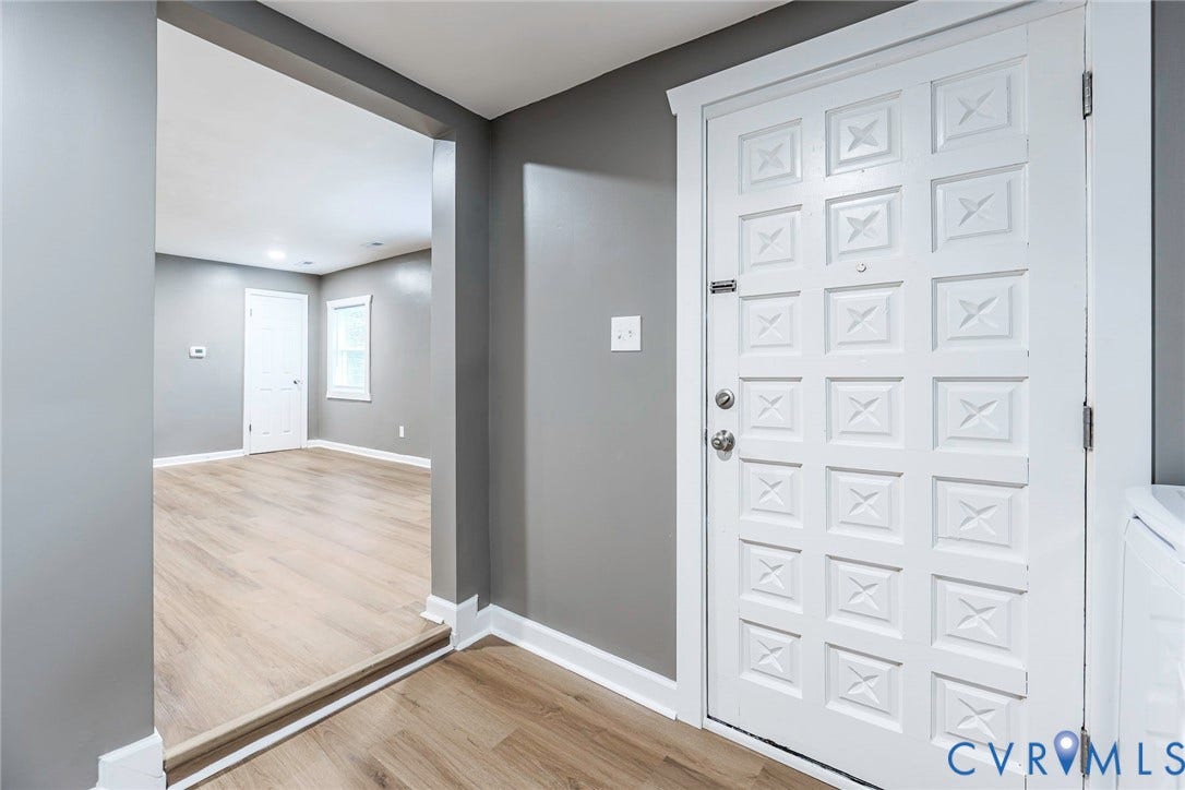 634 Fayette Avenue, Richmond, VA 23222 White paneled entry door with decorative detailing