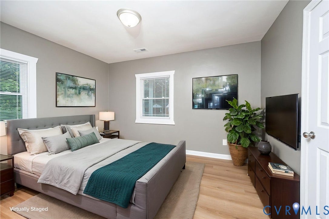 634 Fayette Avenue, Richmond, VA 23222 Light-toned wood-finish flooring complements gray walls