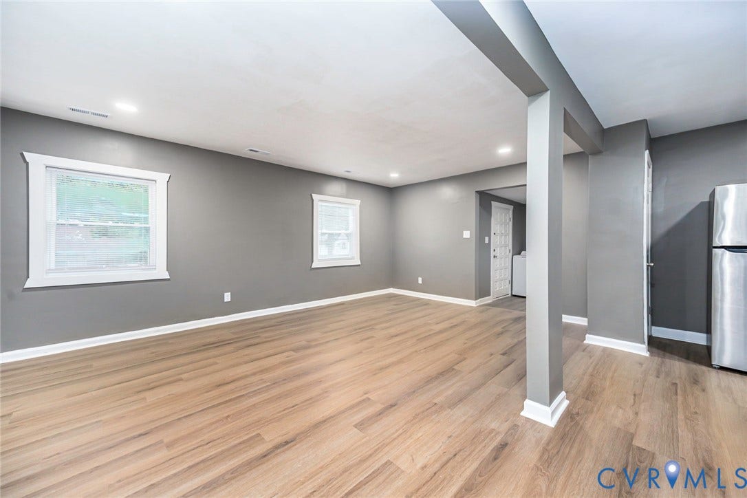 634 Fayette Avenue, Richmond, VA 23222 Spacious room featuring wood-finish flooring, recessed lighting, and a neutral wall color