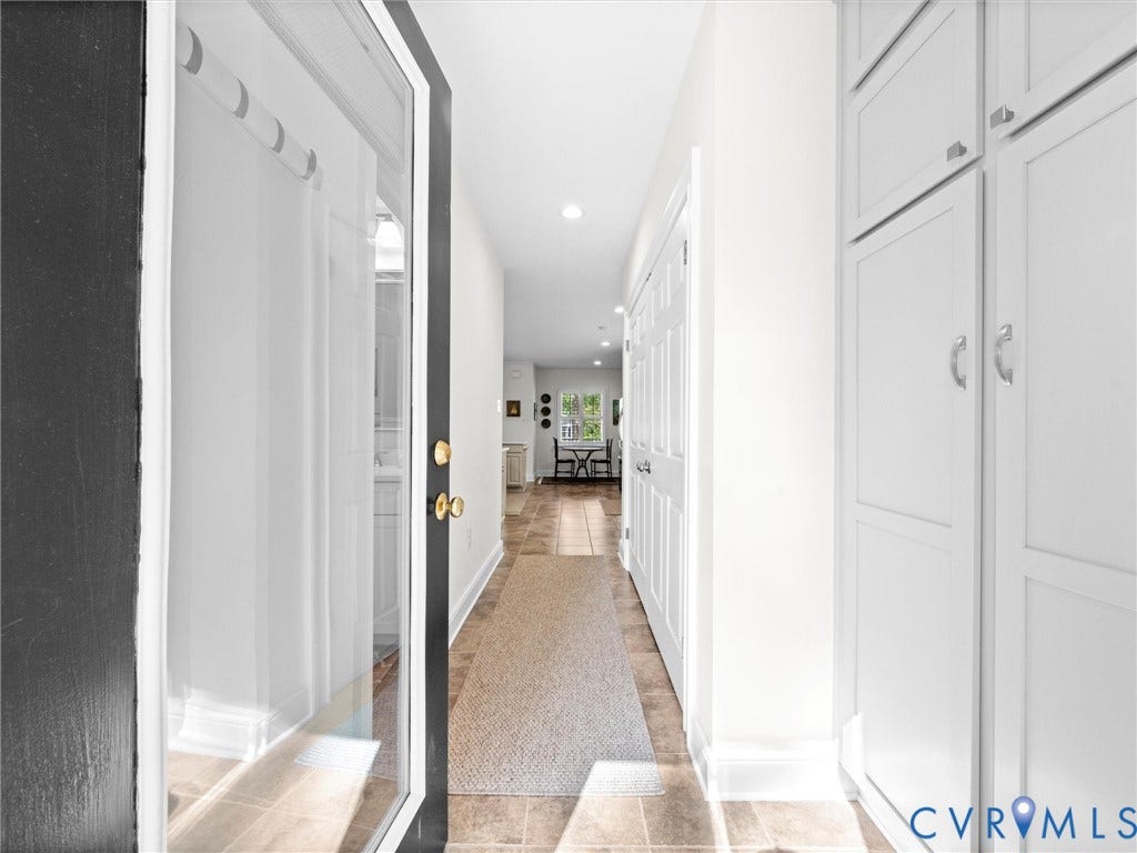 7723 Stuart Hall Road, Rollingwood Terrace, Henrico, VA 23229 Recessed lighting, tile flooring, white shaker-style cabinetry, and solid panel interior doors