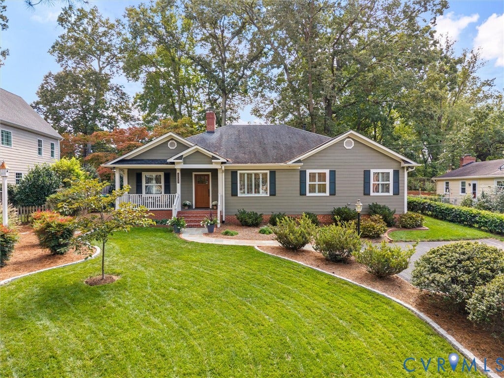 7723 Stuart Hall Road, Rollingwood Terrace, Henrico, VA 23229 Siding exterior with decorative shutters, covered front porch, and a brick chimney