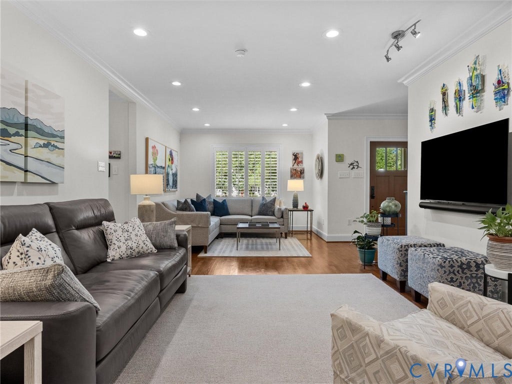 7723 Stuart Hall Road, Rollingwood Terrace, Henrico, VA 23229 Recessed lighting, wood-finish flooring, white plantation shutters, crown molding, and a solid wood entry door with glass paneling