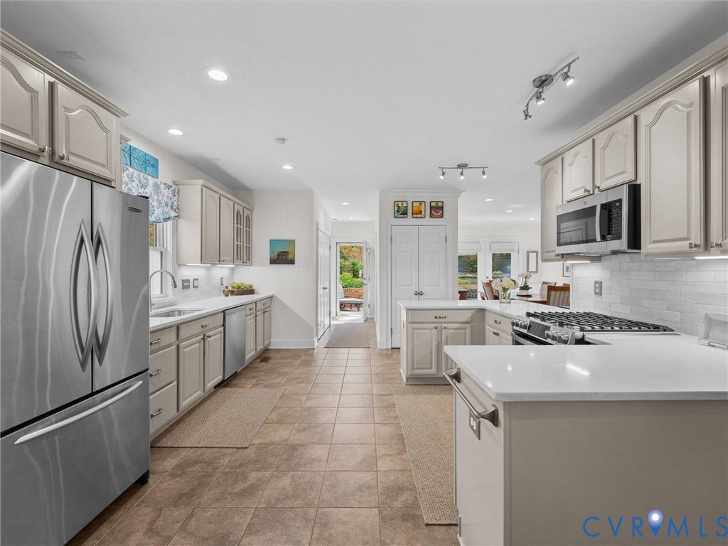7723 Stuart Hall Road, Rollingwood Terrace, Henrico, VA 23229 Kitchen featuring stainless steel appliances, light cabinetry, white countertops, tile flooring, and recessed lighting