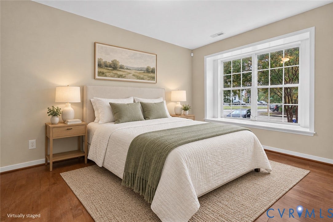 (#2) 1st floor bedroom with french doors and access to half bath
