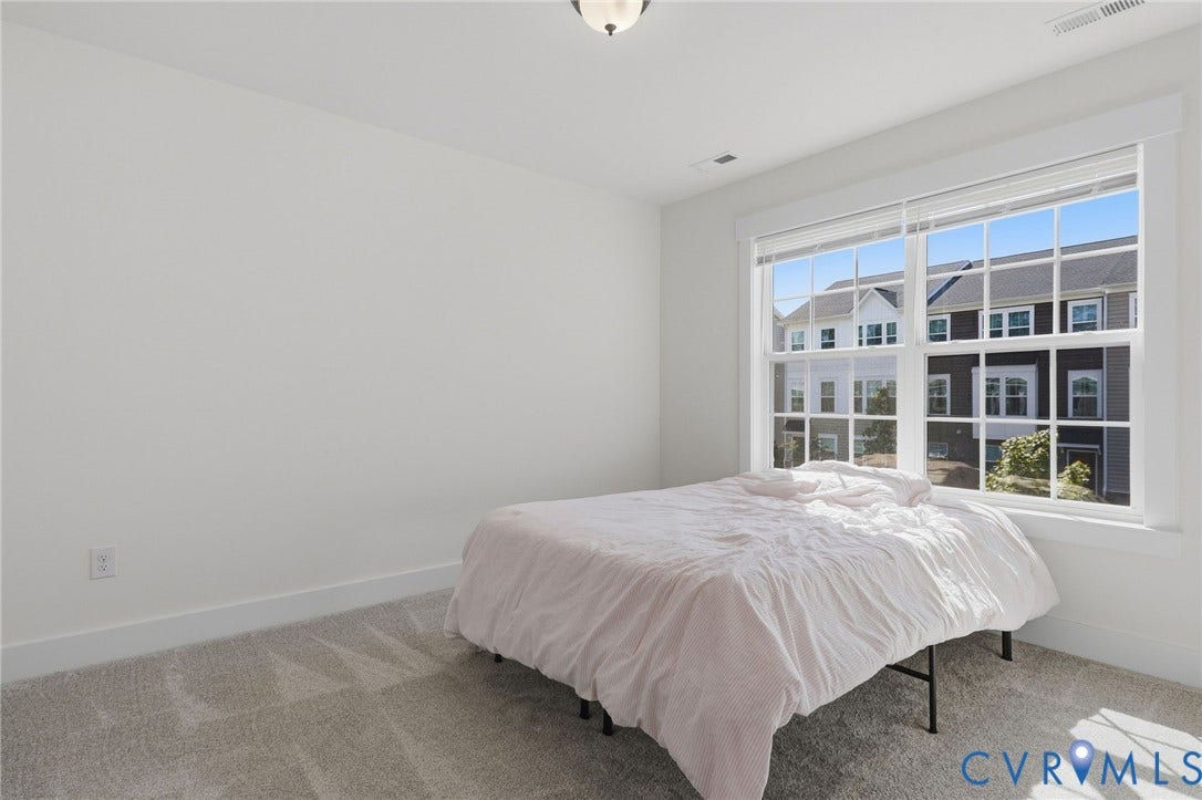 6142 Jackline Run, Watermark, Chesterfield, VA 23234 White walls, gray carpet, and a large window with white trim