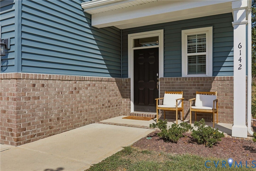 6142 Jackline Run, Watermark, Chesterfield, VA 23234 Brick and siding exterior with a covered entry