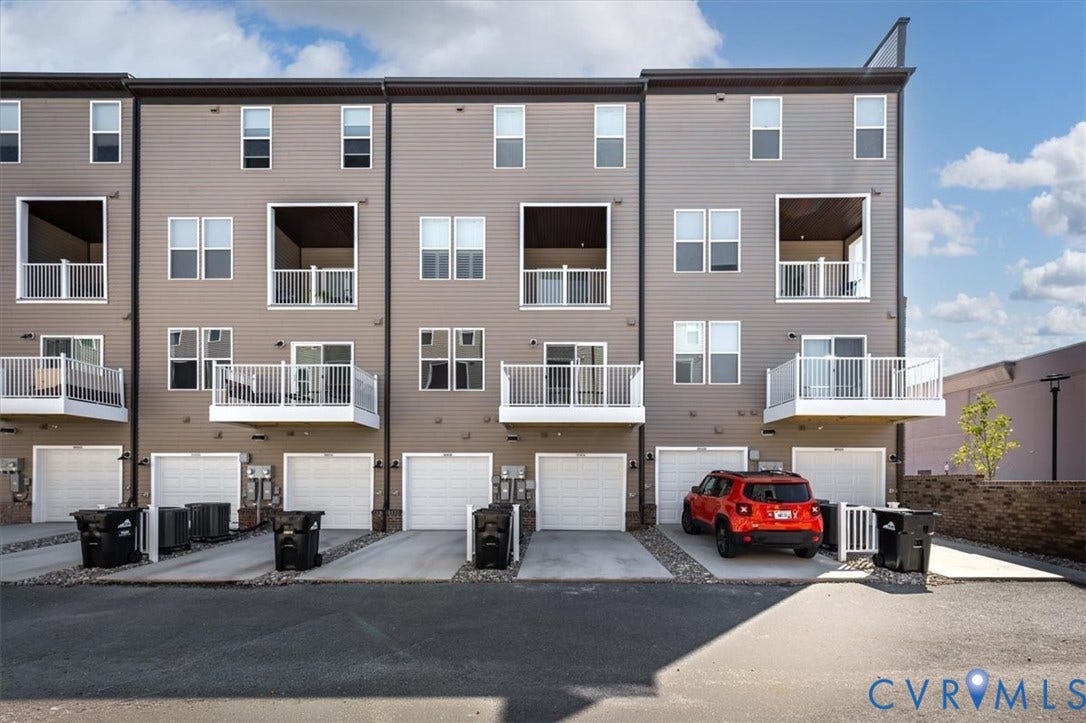 9690 Turning Point Dr, #A, 4E300, Glen Allen, VA 23059 Contemporary multi-story exterior with horizontal siding, multiple private balconies, and integrated garage spaces