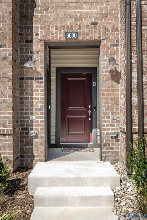 9690 Turning Point Dr, #A, 4E300, Glen Allen, VA 23059 Brick exterior with a dark-paneled entry door