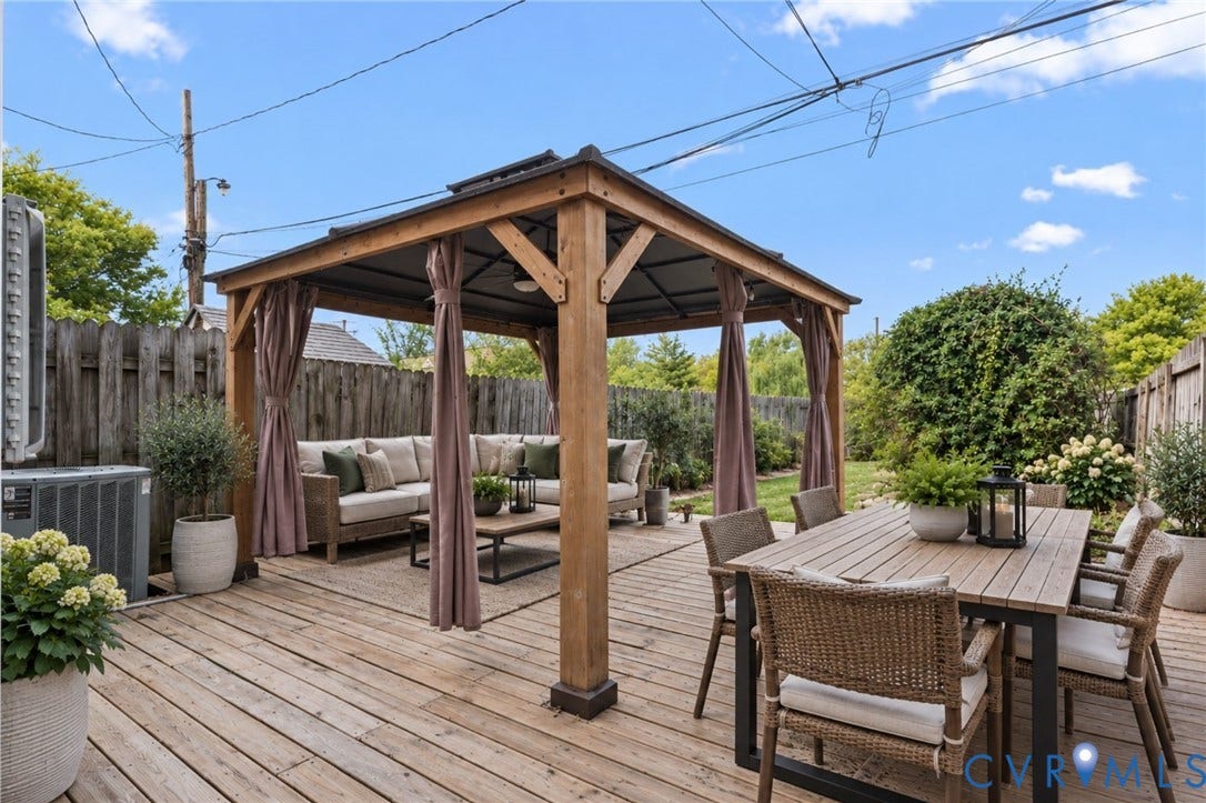 724 N 1st Street, Jackson Ward, Richmond, VA 23219 Expansive wood-finish deck featuring a wood gazebo with draped curtains