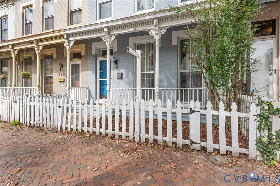724 N 1st Street, Jackson Ward, Richmond, VA 23219 Brick paver sidewalk leading to a white picket fence