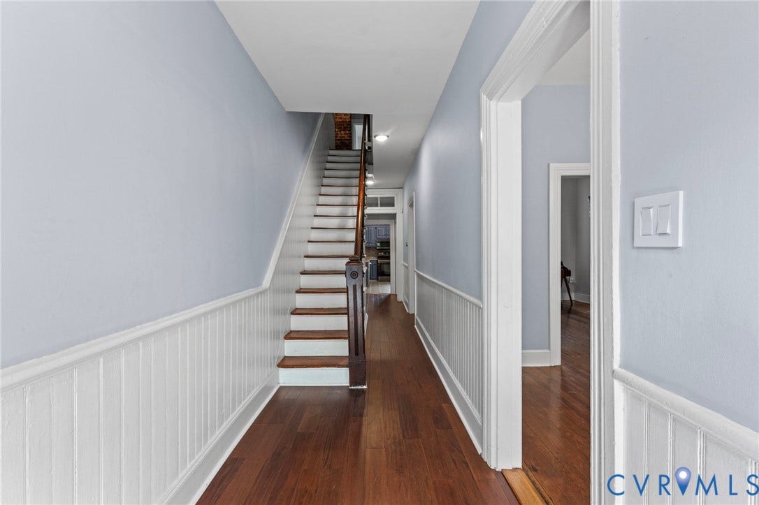 724 N 1st Street, Jackson Ward, Richmond, VA 23219 Wood-finish flooring throughout the hallway and staircase