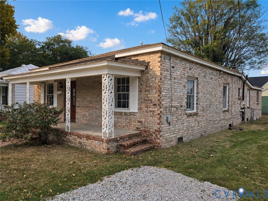 1223 Paul Street, Hillcrest, Petersburg, VA 23803 Brick exterior with a covered front porch featuring decorative white columns