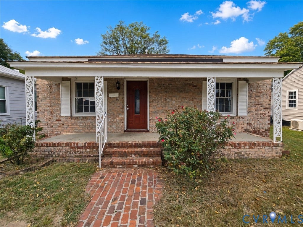 1223 Paul Street, Hillcrest, Petersburg, VA 23803 Brick exterior with white decorative porch columns, a covered porch, and a red brick pathway