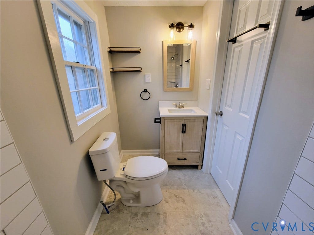 1223 Paul Street, Hillcrest, Petersburg, VA 23803 Contemporary vanity with white countertop and integrated sink