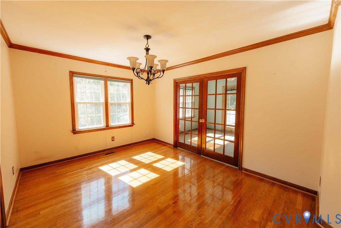 2561 Glenridge Court, Glenbrooke, Powhatan, VA 23139 Dining Room with hardwood floors and pocket doors to Breakfast Room