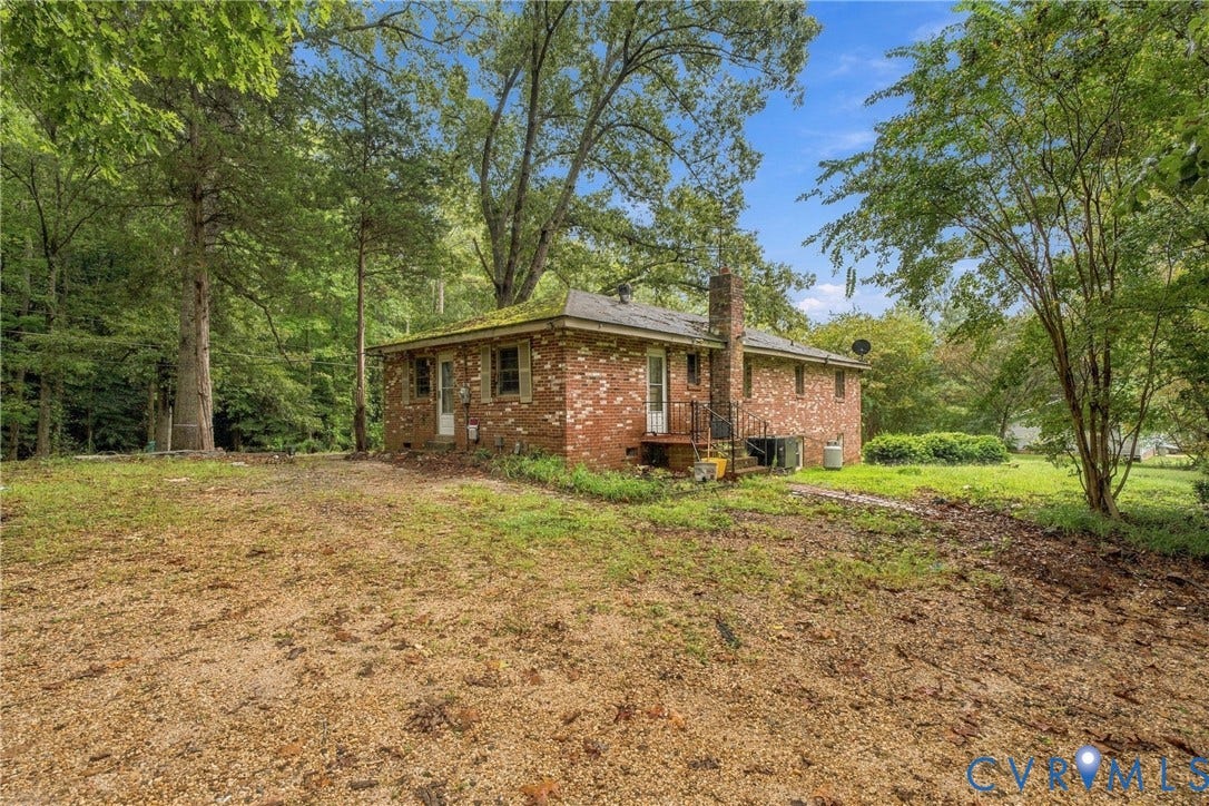 8150 Bradbury Road, Henrico, VA 23231 Brick exterior with a side-facing chimney