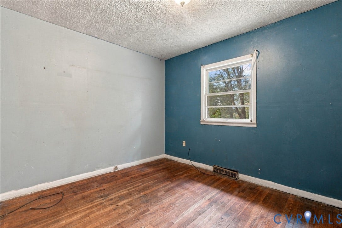 8150 Bradbury Road, Henrico, VA 23231 Hardwood-style flooring and a single-pane window