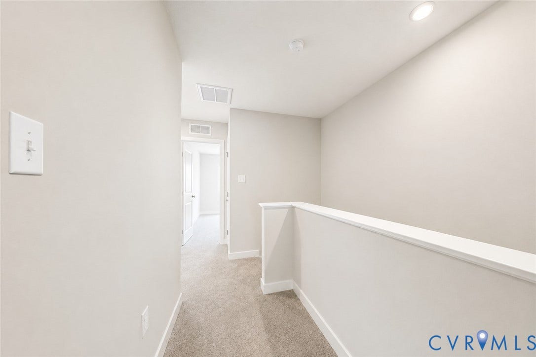 10607 Pink Lilly Lane, Chester, VA 23831 Carpeted hallway with light-toned walls and recessed lighting