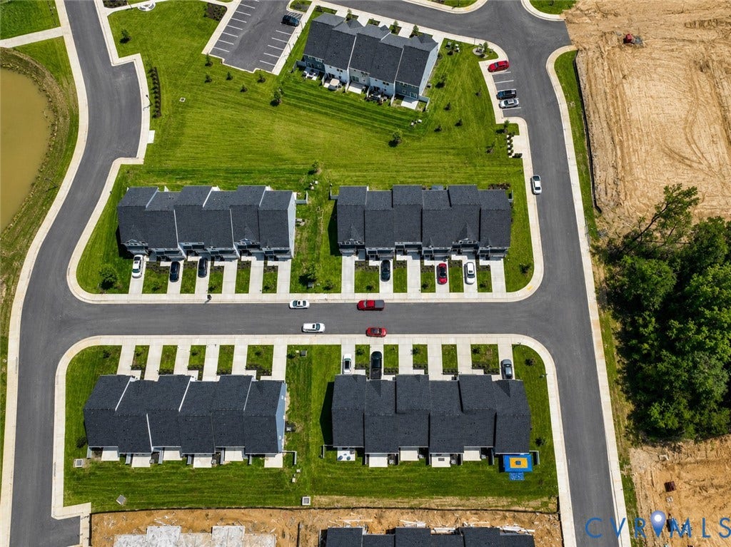 10607 Pink Lilly Lane, Chester, VA 23831 New construction townhome community with paved roadways and individual parking spaces