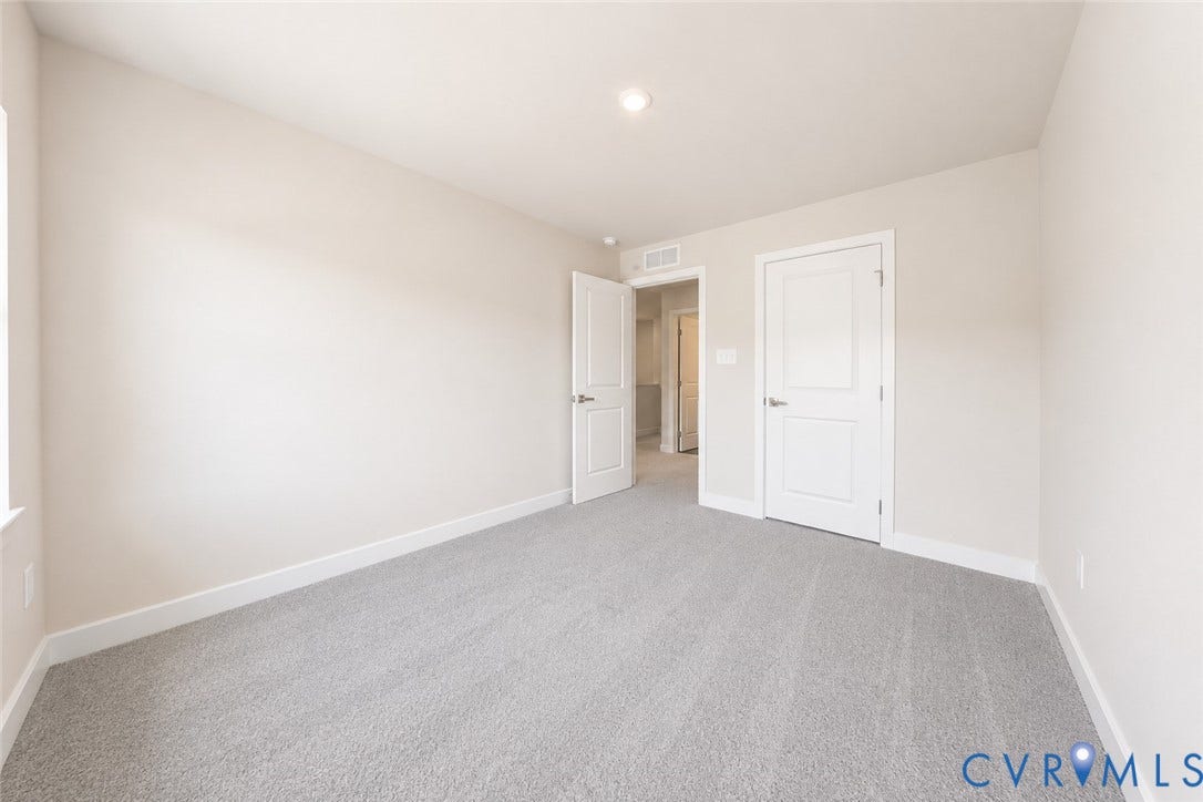 10607 Pink Lilly Lane, Chester, VA 23831 Soft gray carpeting and a neutral wall color