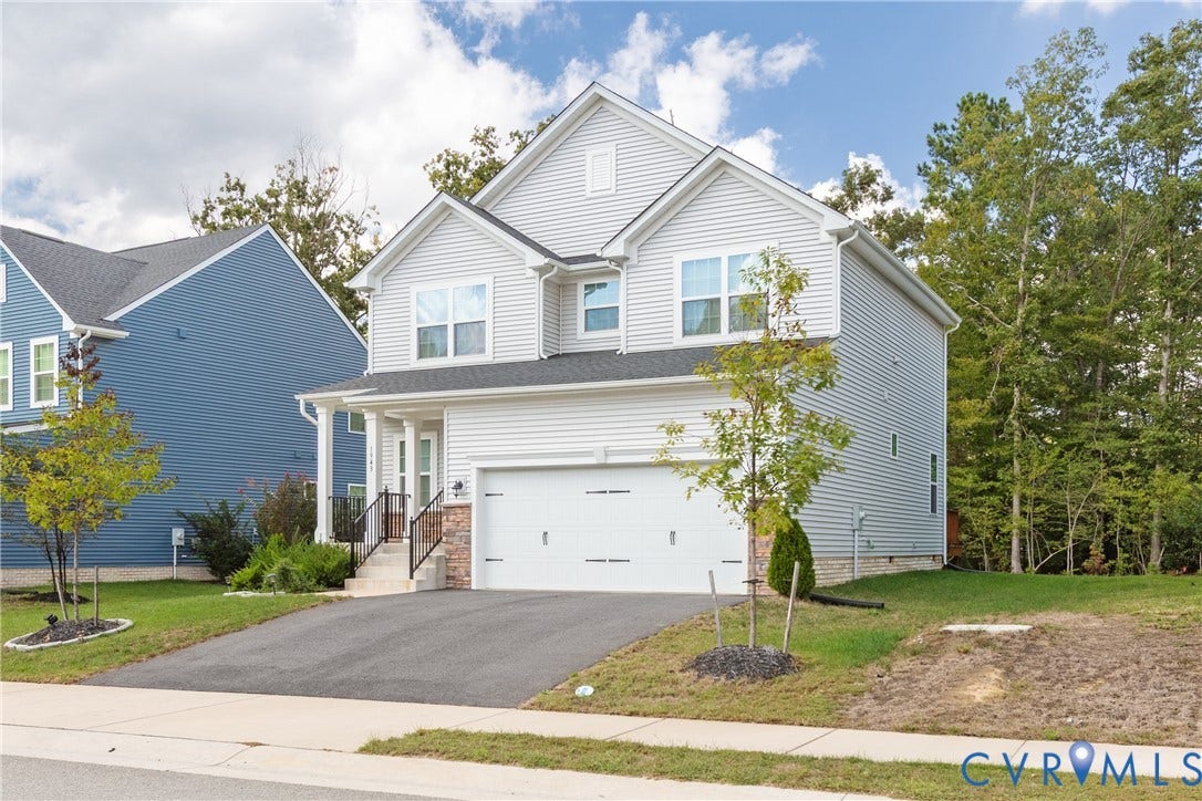1943 Enon Station Drive, Chester, VA 23836 Two-story exterior with light gray siding, white trim, and a dark shingle roof