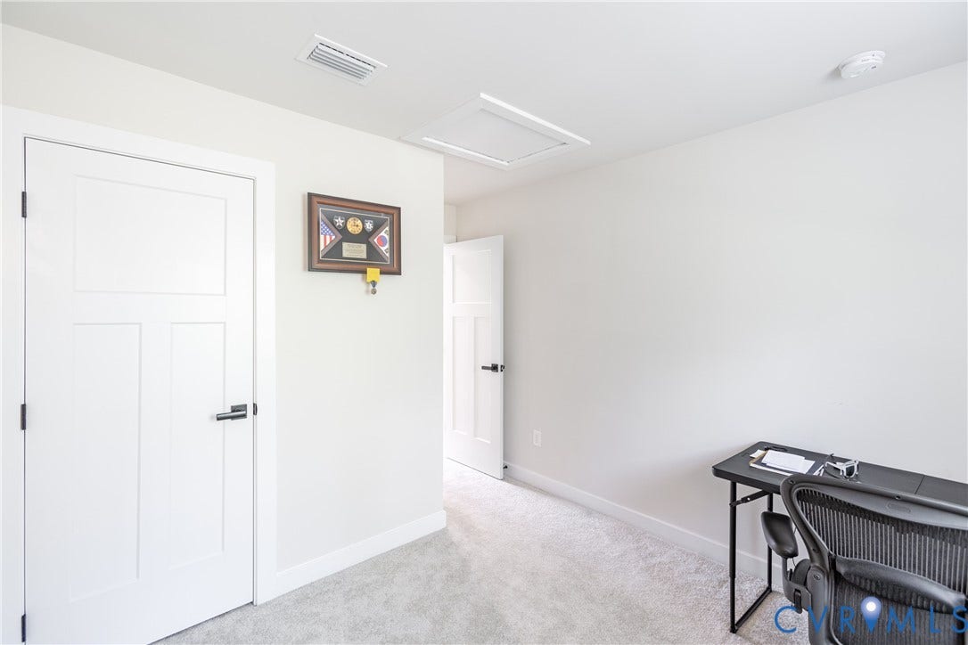 1943 Enon Station Drive, Chester, VA 23836 White three-panel interior doors with dark hardware
