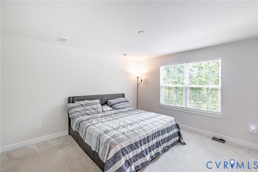 1943 Enon Station Drive, Chester, VA 23836 Recessed ceiling light, wall-to-wall carpeting, window with blinds, and white trim