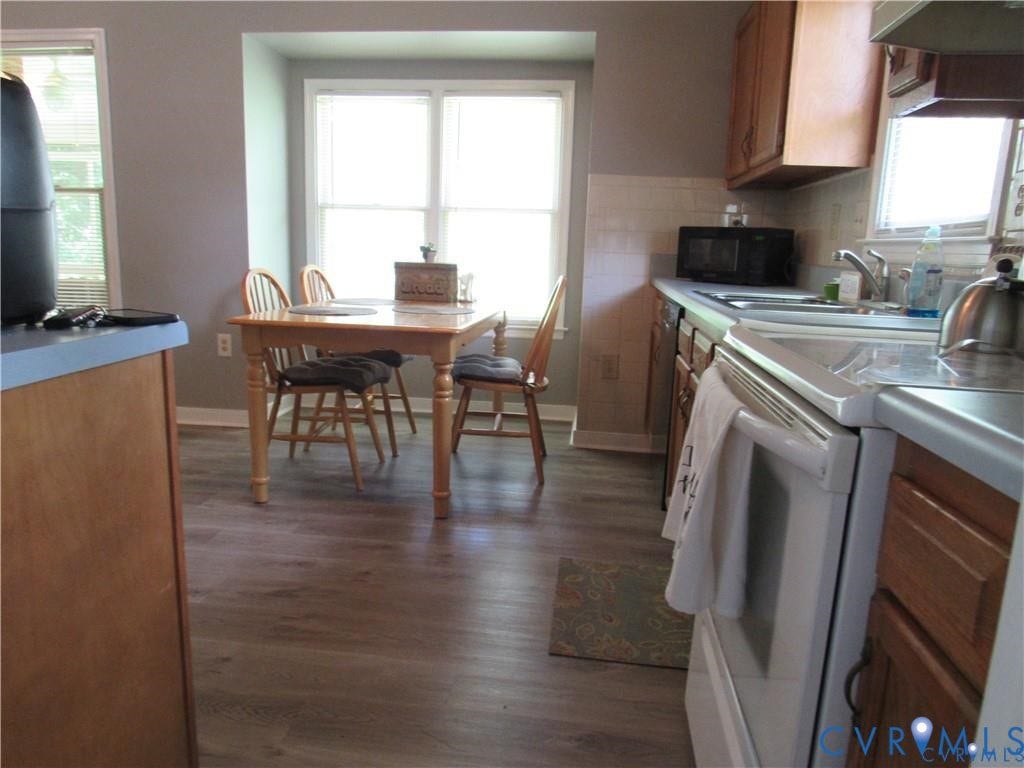 8506 Lyndale Drive, Chesterfield, VA 23235 Wood-finish flooring throughout, light wood cabinetry, and a built-in oven
