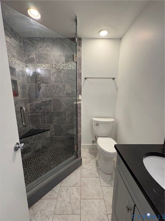 305 N Hamilton Street, #C, Richmond, VA 23221 Glass-enclosed shower with a built-in bench and pebble-tile flooring