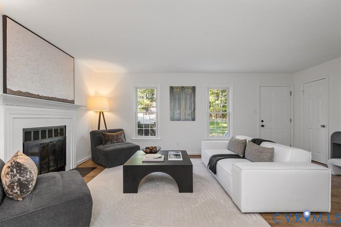 3031 Speeks Drive, Midlothian, VA 23112 White walls, wood-finish flooring, and a fireplace with a mantel