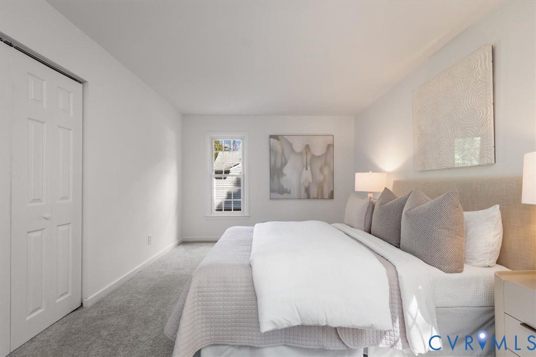 3031 Speeks Drive, Midlothian, VA 23112 Neutral wall color, carpeted flooring, window with white trim, bi-fold closet doors, and recessed lighting