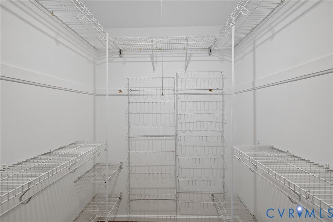 Primary Walk-In Closet Plus Another