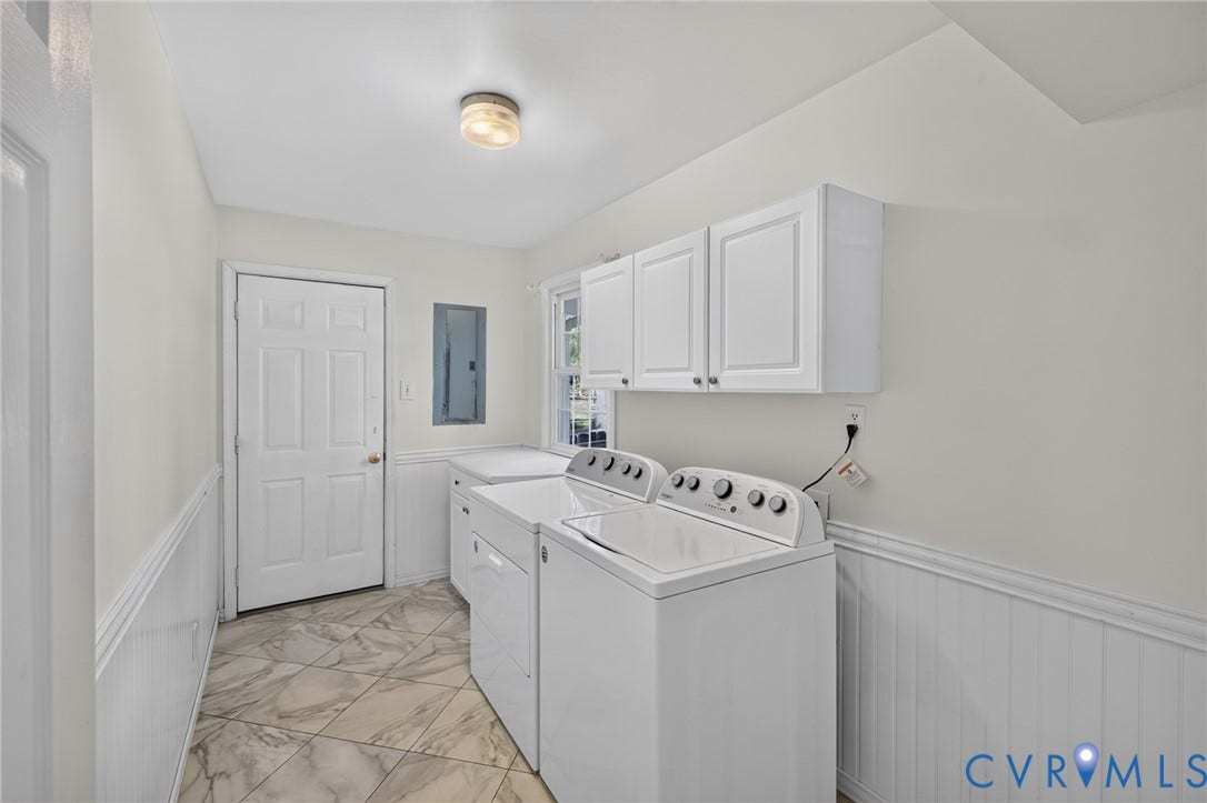 Laundry Room off of kitchen leading to garage